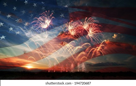 Celebratory Fireworks On The Background Of The US Flag And Sunrise. Independence Day