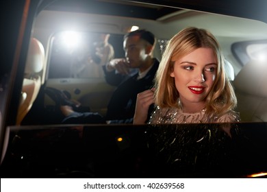 Celebrity Couple In Back Of A Car, Photographed By Paparazzi