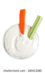 Celery And Carrot Sticks In Bowl Of Dip, Cut Out On White Background