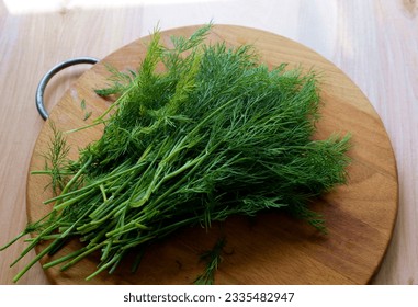 Celery leaves on wooden board - Powered by Shutterstock