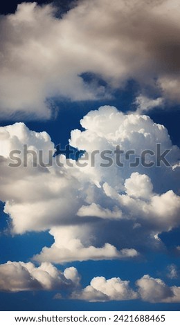 The celestial dome is an enchanting spectacle of unbroken blue, graced by the passage of elegant clouds.