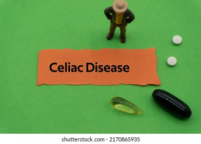 Celiac Disease.The Word Is Written On A Slip Of Colored Paper. Health Terms, Health Care Words, Medical Terminology. Wellness Buzzwords. Disease Acronyms.