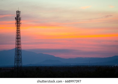 Cell phone antenna tower, Signal Tower with sunset background.