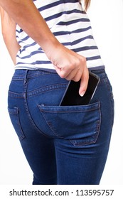 Cell phone in back pocket of girl's jeans