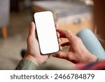 cell phone blank white screen mockup.hand holding texting using mobile on desk at office.background empty space for advertise.work people contact marketing business,technology