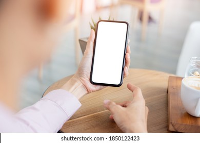 Cell Phone Blank White Screen Mockup.woman Hand Holding Texting Using Mobile On Desk At Office.background Empty Space For Advertise.work People Contact Marketing Business,technology