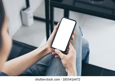 cell phone blank white screen mockup.woman hand holding texting using mobile on desk at office.background empty space for advertise.work people contact marketing business,technology - Shutterstock ID 1855416472