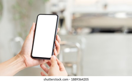 Cell Phone Blank White Screen Mockup.woman Hand Holding Texting Using Mobile On Desk At Office.background Empty Space For Advertise.work People Contact Marketing Business,technology