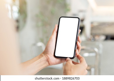 Cell Phone Blank White Screen Mockup.woman Hand Holding Texting Using Mobile On Desk At Office.background Empty Space For Advertise.work People Contact Marketing Business,technology