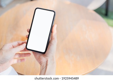 Cell Phone Blank White Screen Mockup.woman Hand Holding Texting Using Mobile On Desk At Office.background Empty Space For Advertise.work People Contact Marketing Business,technology