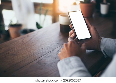 Cell Phone Blank White Screen Mockup.hand Holding Texting Using Mobile On Desk At Office.background Empty Space For Advertise.work People Contact Marketing Business,technology