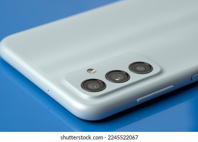 Cell phone camera lens. The concept of a smartphone rear camera lens - Shutterstock ID 2245522067