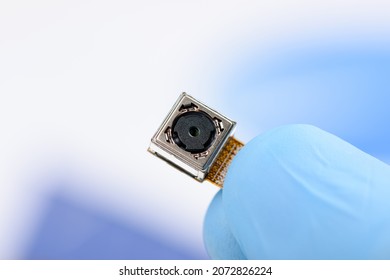 Cell Phone Camera Module In Scientist Hand