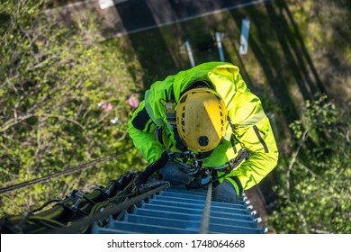 Cell Phone Installers Work On The Tower