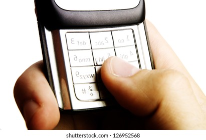 Cell Phone in a man hand. Isolated on white background.