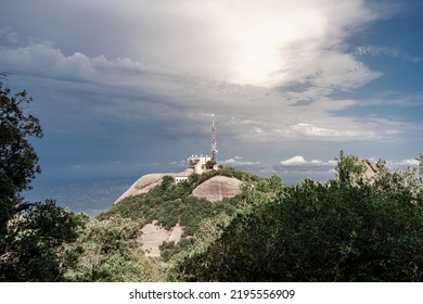 Cell Tower (Base Station Or Base Radio Station) On The Top Of Montserrat, Mountain, Catalonia, Spain. View From Above. Aerial View.