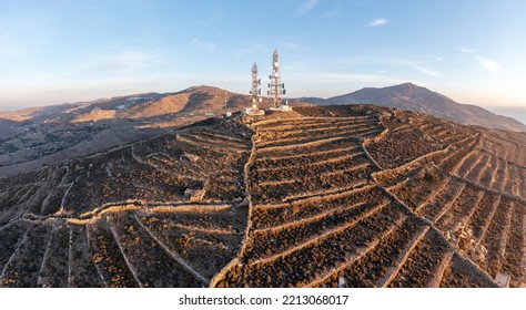 Cell Tower. Cellular Base Station, Mobile Phone Antenna Aerial View. 5G Radio Network Telecom Transmitter On Mountain Top. Rural Background