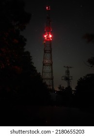 Cell Tower Tower In Night Forest And Perfect Starry Sky Behind