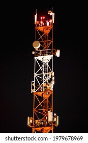 Cell Tower On A Black Background. Mobile Communication Base Station In The Night