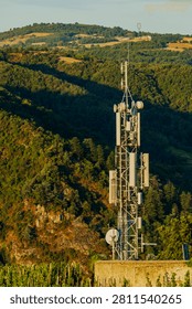 Cell tower providing wireless connectivity across Crozes Hermitage hills and vineyards