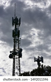 Cell Tower Silhouette In The False Twilight Before A Storm