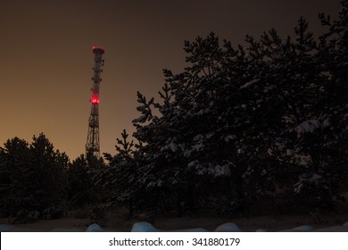 Cell Tower At Winter Night Outside The City