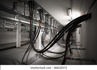 the cellar of an electric station, incoming electric wires