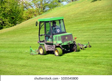 Celle, Lower Saxony / Germany - May 6, 2015: Commercial Lawn Mower In Use - Municipal Park In Celle - Germany