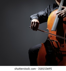 Cello Player Or Cellist Performing In An Orchestra Isolated With Copy Space