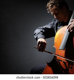 Cello Player Or Cellist Performing In An Orchestra Isolated With Copy Space