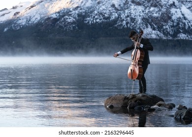 Cello Player Performing Outdoors At Sunrise