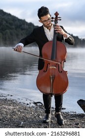 Cello Player Performing Outdoors At Sunrise