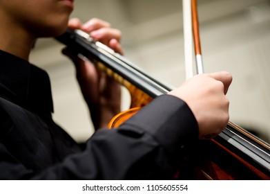 Cello Player Pizzicato 