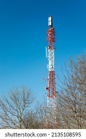 cellphone mast, cellphone mast. in red white red