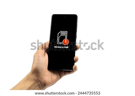 Cellular Problems Concepts. Man hand holding smart phone with full storage icon on screen isolated on white background. All screen graphics are made up.