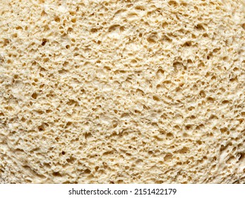 Cellular Texture Of Yeast-free Dough. White Bread Texture, Closeup Slice With Macro Surface Details.