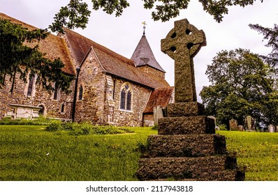 Celtic Cross On Tombstone In Graveyard