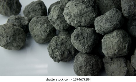 Cement Clinker Nodule On White Background, Is The Basic, Raw Material Used In The Production Of All Types Of Cement.