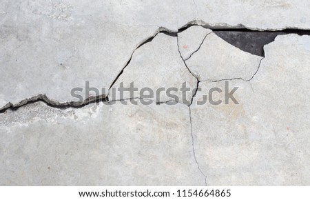 Cement crack wall texture background. 