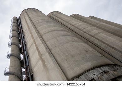 Cement Data Silo Towers, Represents Data Silos In Computer Science, Which Isolate Data Since The Only Access Gate To The Data Is A Single Application