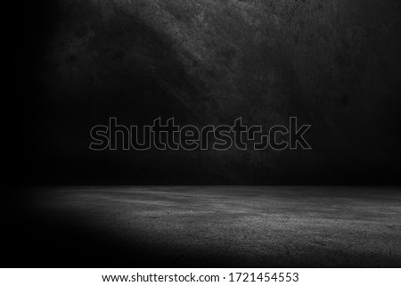 Cement floor and black wall backgrounds, empty room, interior, use for display products.	
