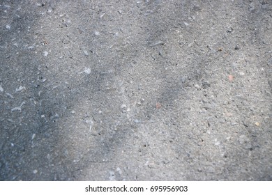 Cement floor surface with shadow of net background.