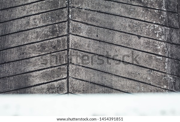 Cement
floor and wall Of the top floor parking lot as an outdoor deck That
is old is a background with a pattern of mold And the walls of the
plaster have old mold stains Abstract
pattern.