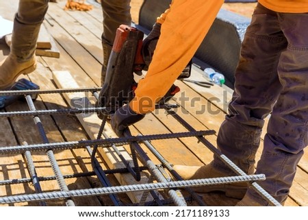 For cement foundations, this tool is used to tie steel bars twisting reinforcement with wire rods