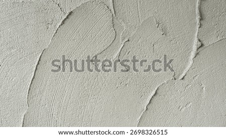Cement Plaster texture wall Background, Rough Concrete mortar mix sand wet material raw building house site polished decorative well gray free space design for text pattern
