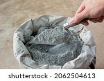Cement powder with trowel put in bag package
