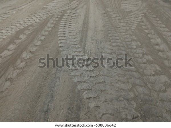  cement\
powder and  wheel track on cement\
floor