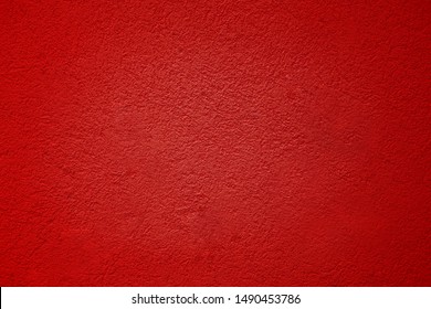 Cement Red plaster wall have rough surface concrete. For texture background images