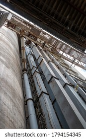 The Cement Silo Represents Data Silos In Computer Science, Which Isolates Data, Since The Only Access Door To The Data Is A Single Application