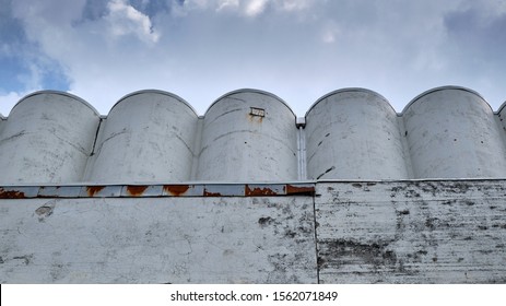 Cement Silo Towers, Represents Data Silos In Computer Science, Which Isolate Data Since The Only Access Gate To The Data Is A Single Application